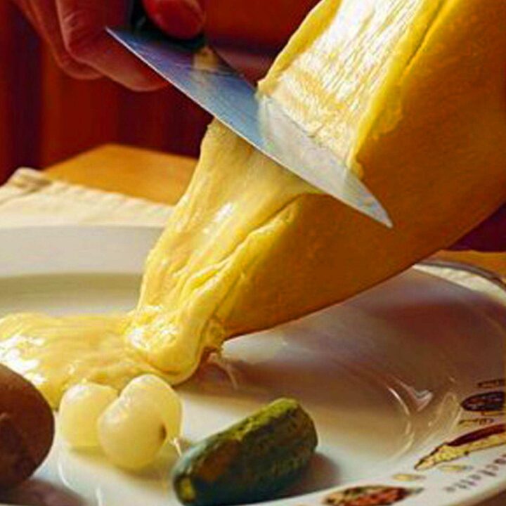 raclette scraped melted cheese