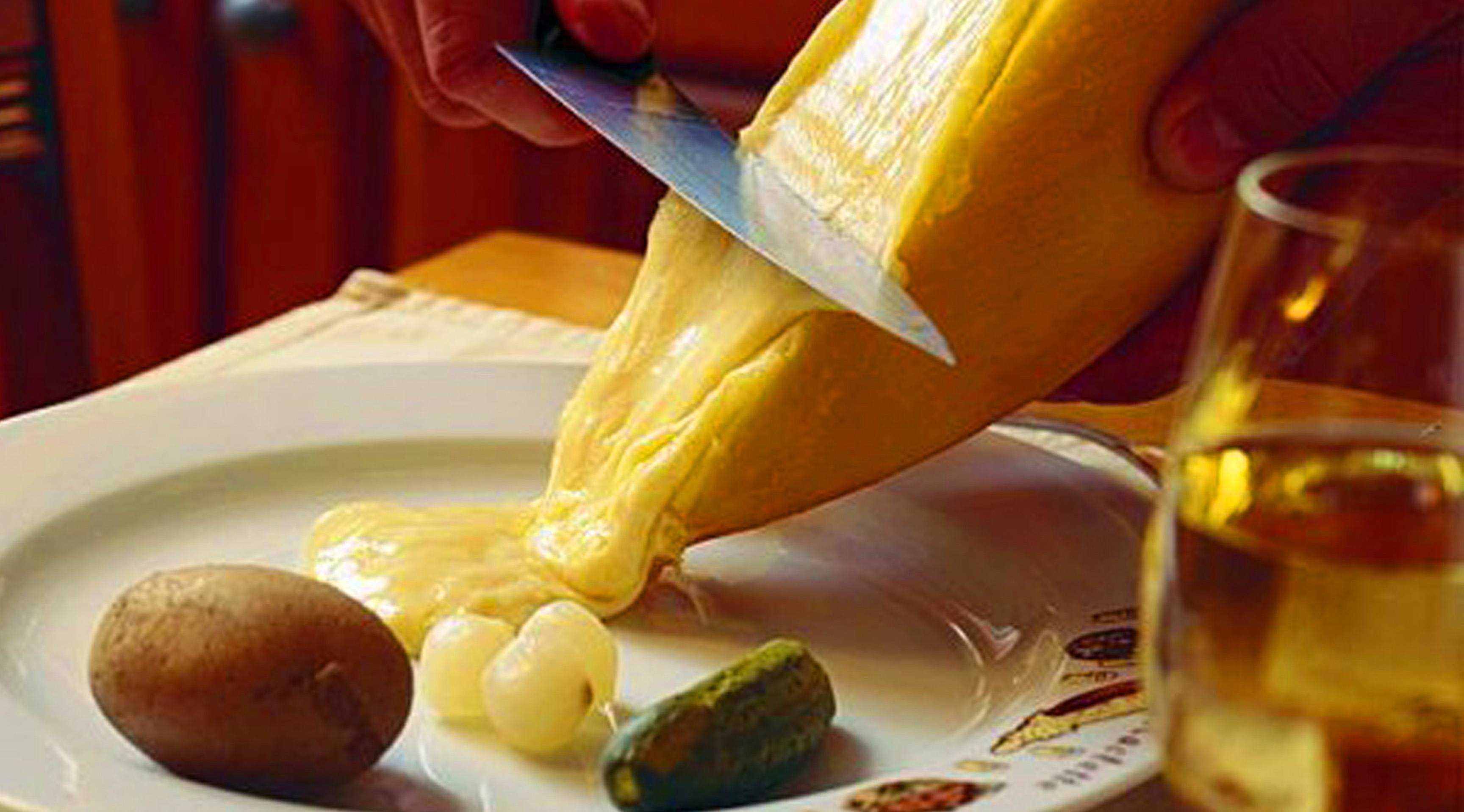 raclette scraped melted cheese
