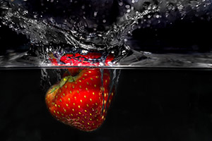 strawberry infused water with strawberries