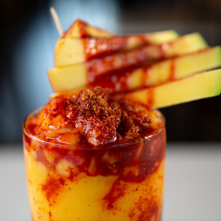 mangonada with sliced fresh mangoes