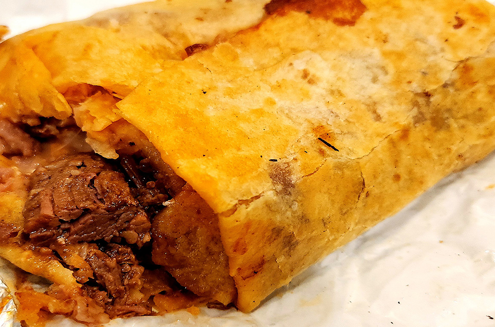 Birria Burrito: endless bites of saucy shredded meat